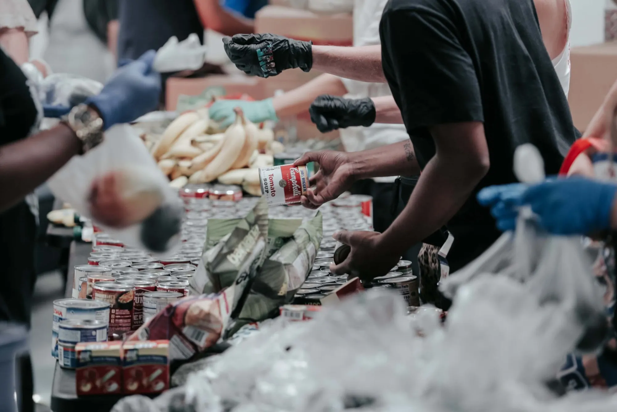 Volunteers packing food donations